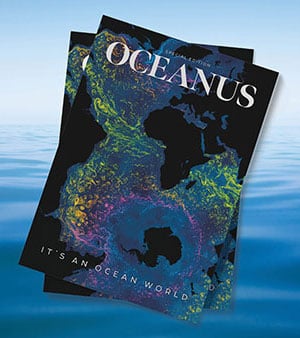 Two copies of Oceanus magazine are laid atop one another over a photo of calm open seas.