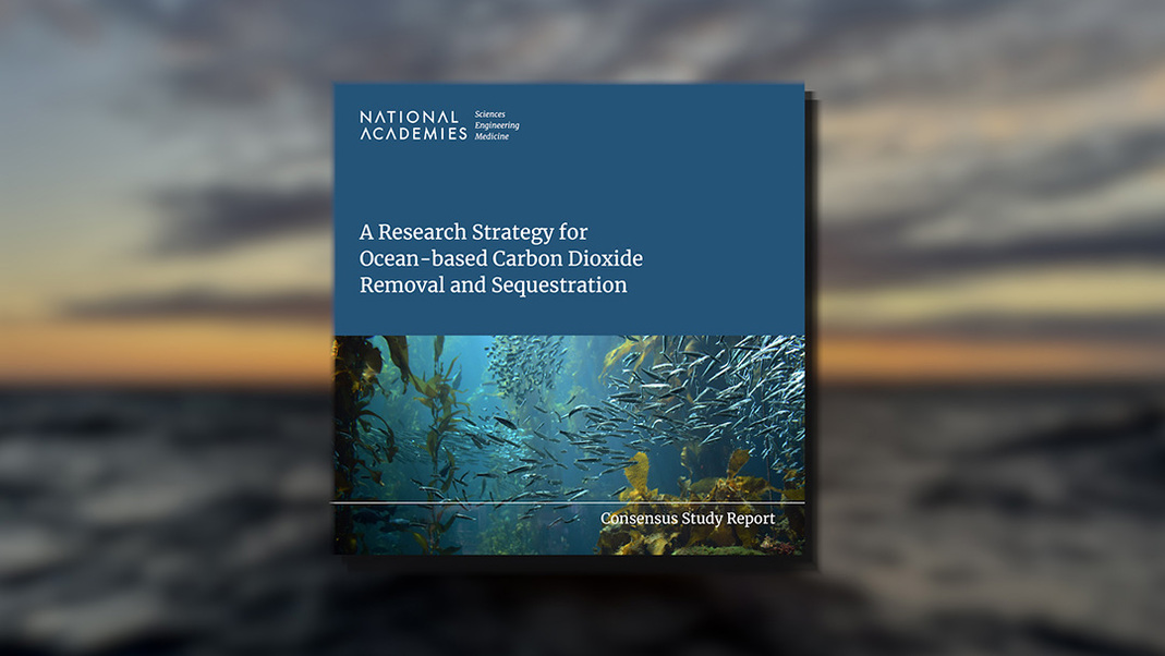 A report pamphlet entitled "A Research Strategy for Ocean-based Carbon Dioxide Removal and Sequestration," superimposed over a blurry ocean image.