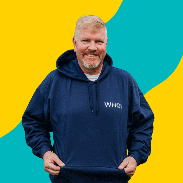 An animated gift. A pair of sunglasses appears and disappears, followed by a girl in a t-shirt with her back turned, and a smiling man in sweatshirt, pulling his shirt forward.